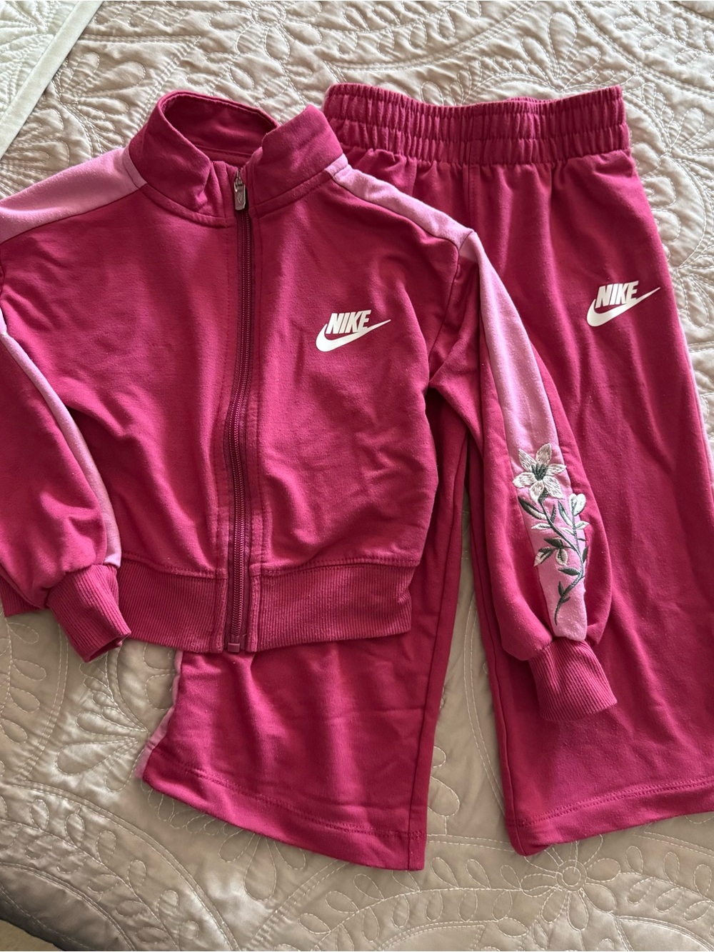 Nike toddler track suit featuring embroidered floral details 2T
